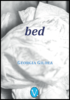 The jacket is filled with a monochrome photo of the rumpled sheets and pillowcase of (presumably) a bed. One third down in large bold lowercase italics, the title: bed. The author's name is about two thirds down, in a slightly ornate font, small caps, pale blue. At the foot of the jacket the logo for V. press also inside a blue oval. All text is centred.